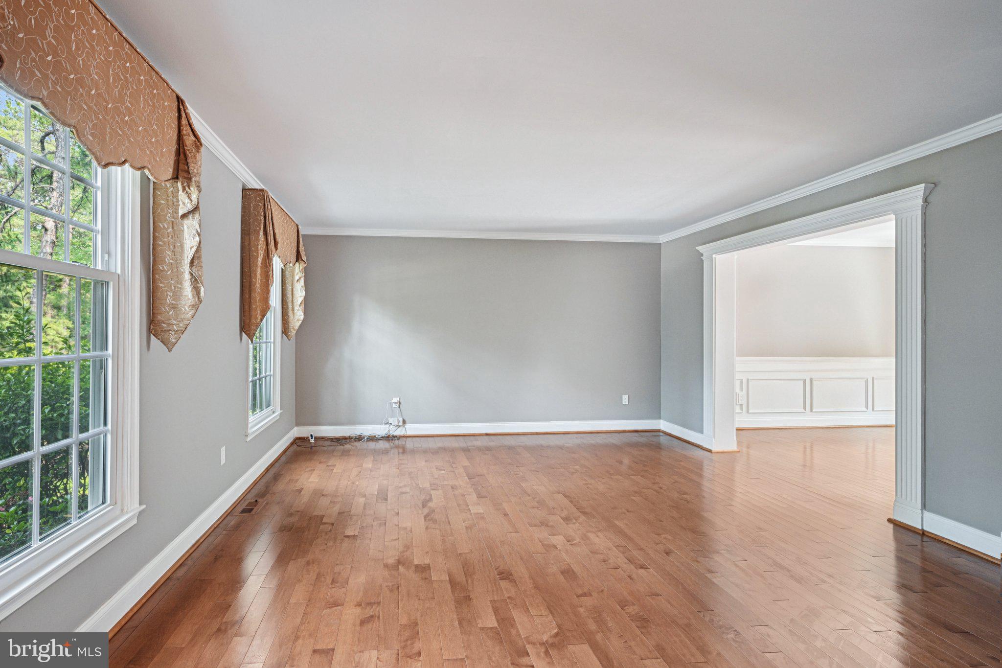 2 Keston Place Voorhees, NJ 08043 - Photo 8 of 83 a view of an empty room with wooden floor and a window