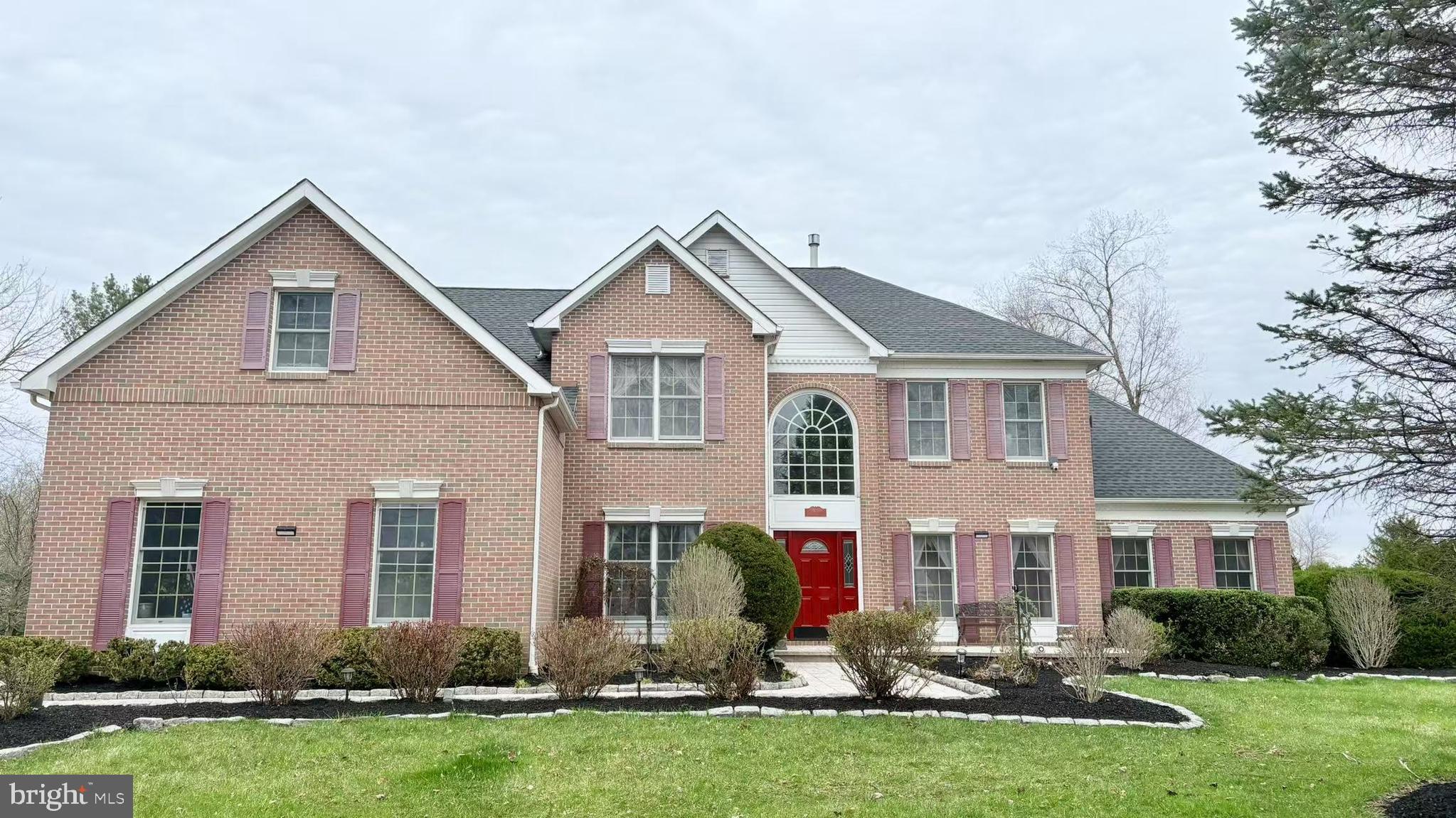 562 Village Road West Princeton Junction, NJ 08550 - Photo 1 of 25 front view of a house with a yard
