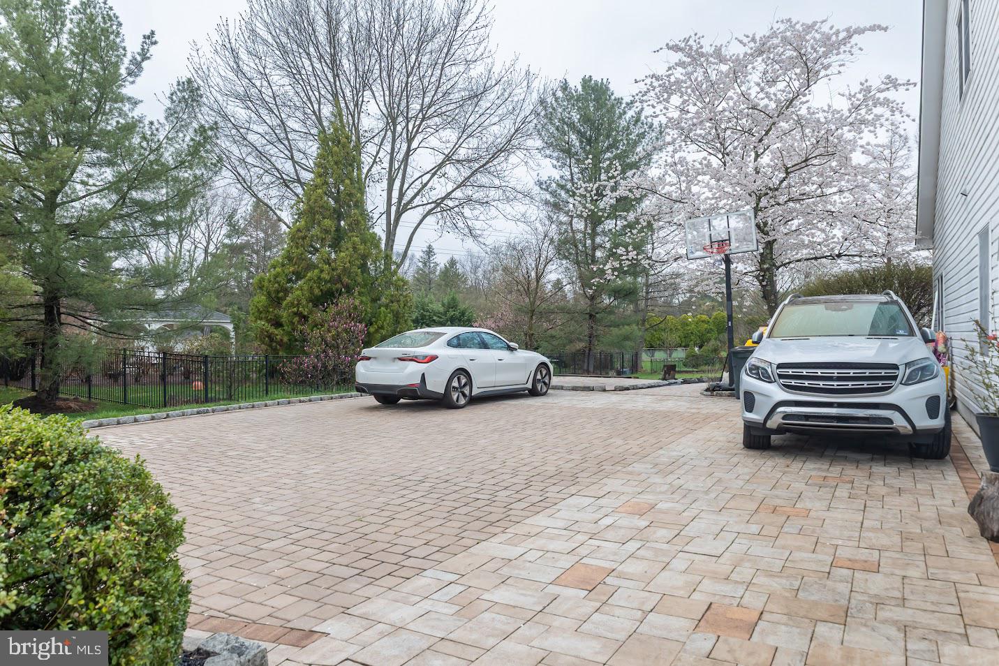 562 Village Road West Princeton Junction, NJ 08550 - Photo 23 of 25 a car parked on the side of a road