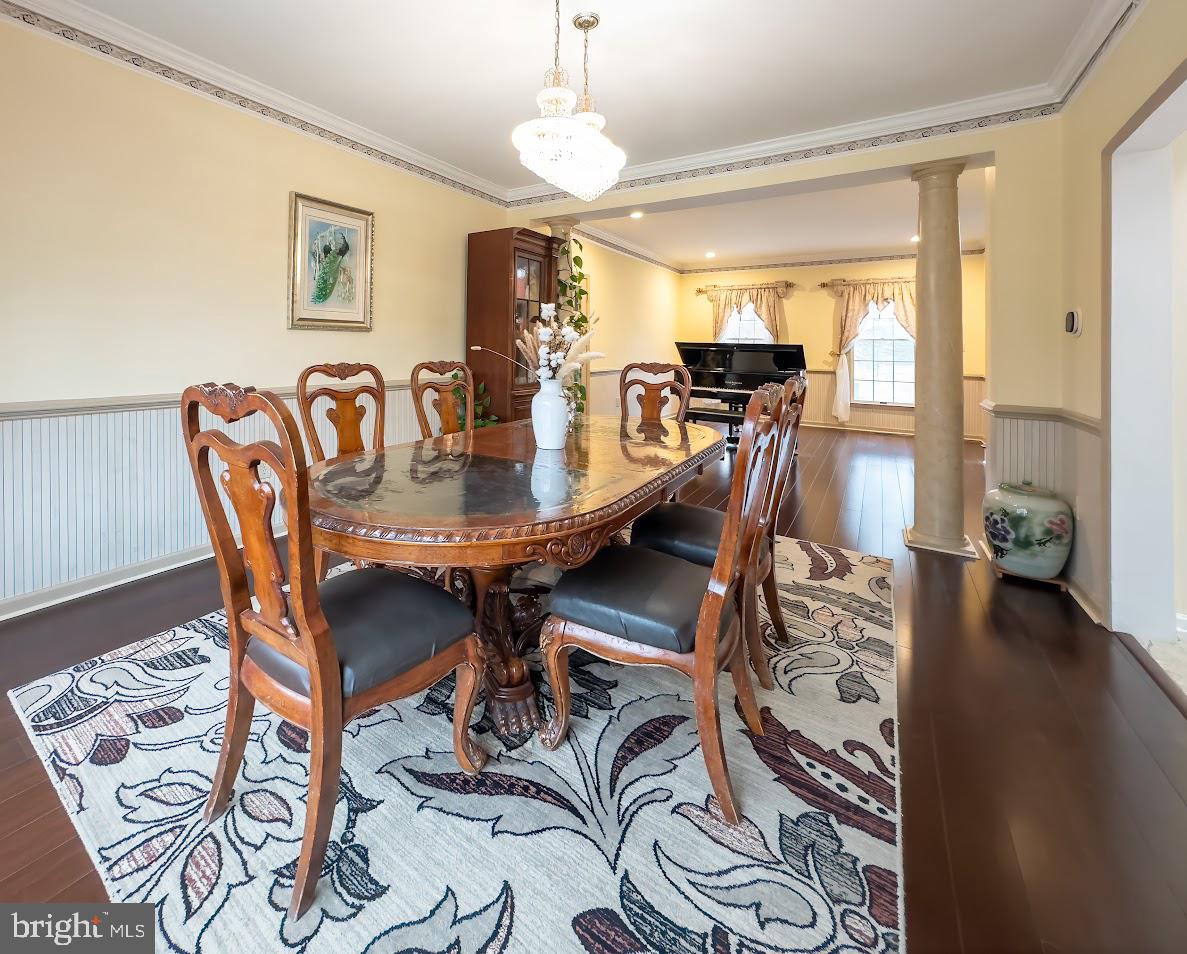 562 Village Road West Princeton Junction, NJ 08550 - Photo 8 of 25 a view of a dining room with furniture