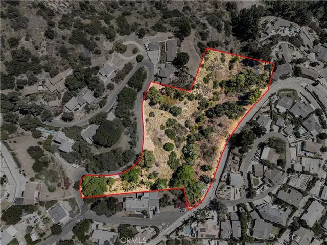 an outdoor space with wooden floor