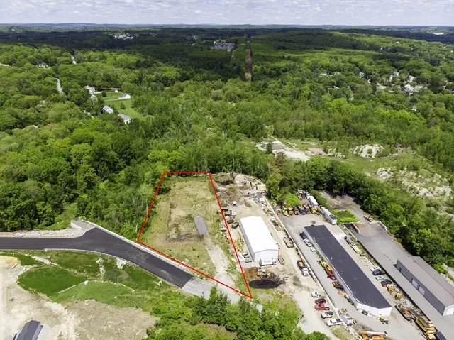 a view of a swimming pool with a yard and mountain view