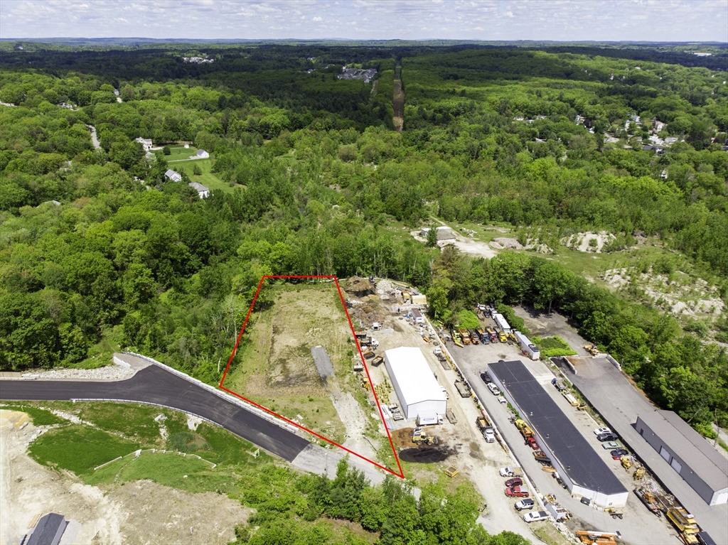 a view of a swimming pool with a yard and mountain view