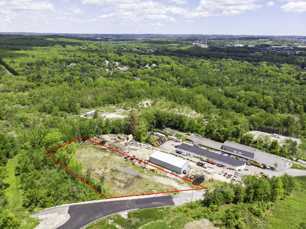 63 Old Ferry Road Methuen, MA 01844 - Photo 2 of 10 a view of a city with lush green forest