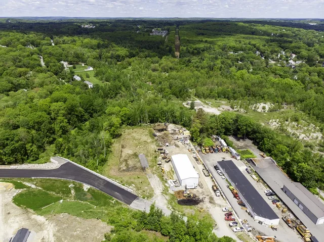 a view of a lake with a yard