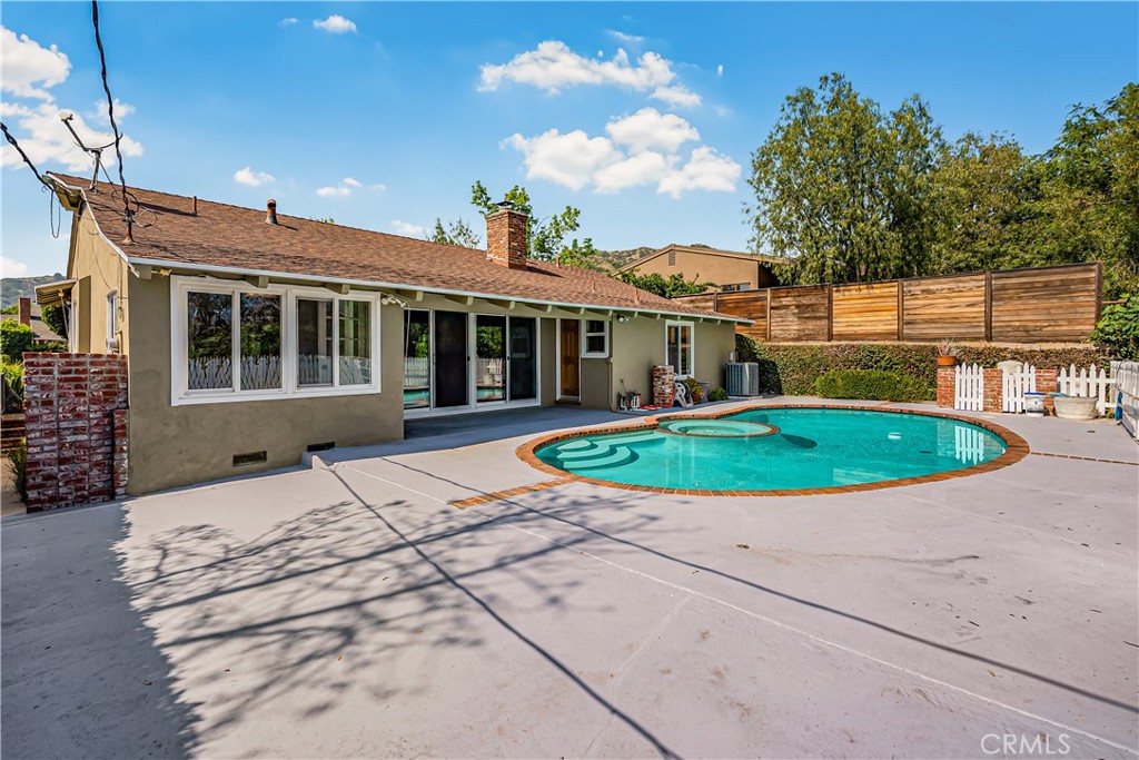 1111 Arbor Dell Road Los Angeles, CA 90041 - Photo 27 of 42 a view of a house with a backyard and a patio