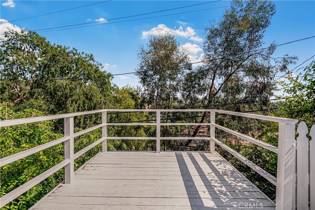 1111 Arbor Dell Road Los Angeles, CA 90041 - Photo 29 of 42 a view of a balcony with wooden floor