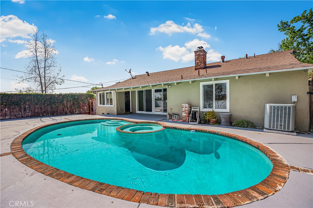 1111 Arbor Dell Road Los Angeles, CA 90041 - Photo 30 of 42 a view of a house with swimming pool