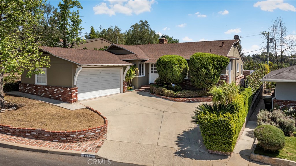 1111 Arbor Dell Road Los Angeles, CA 90041 - Photo 42 of 42 a view of a house with potted plants