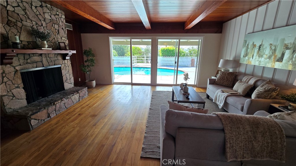 1111 Arbor Dell Road Los Angeles, CA 90041 - Photo 5 of 42 a living room with furniture and a fireplace