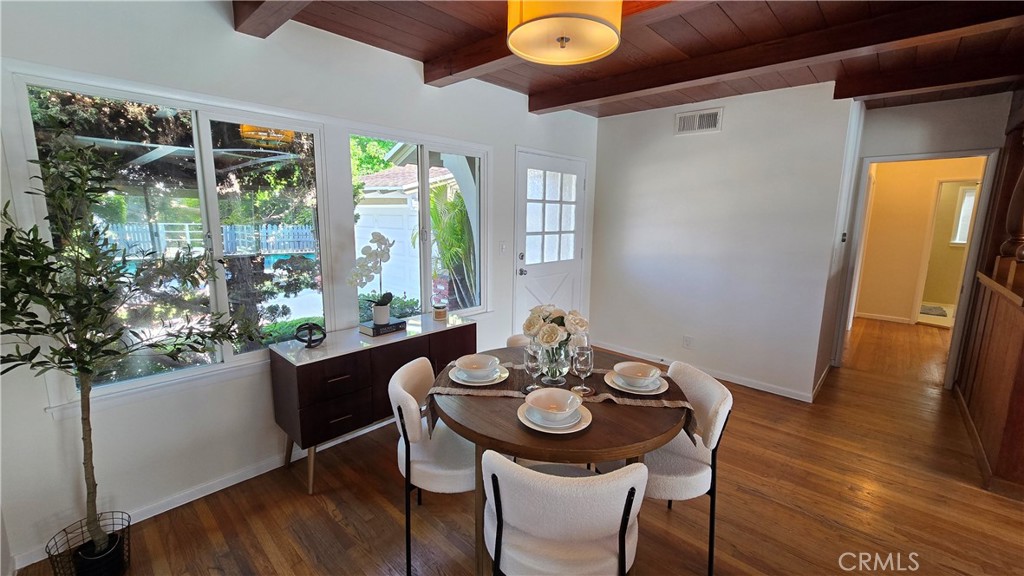 1111 Arbor Dell Road Los Angeles, CA 90041 - Photo 7 of 42 a view of a dining room with furniture window and wooden floor
