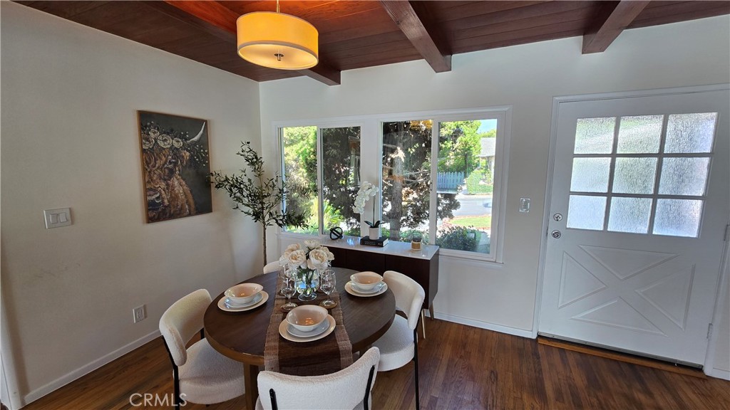 1111 Arbor Dell Road Los Angeles, CA 90041 - Photo 8 of 42 a view of a dining room with furniture window and wooden floor