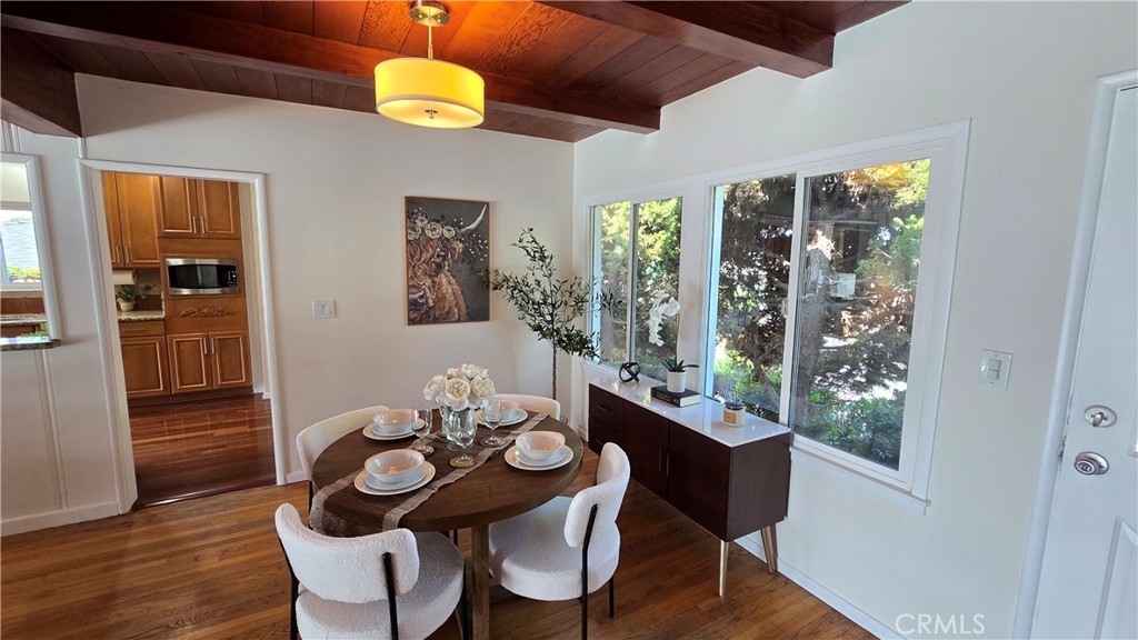 1111 Arbor Dell Road Los Angeles, CA 90041 - Photo 9 of 42 a dining room with furniture and wooden floor