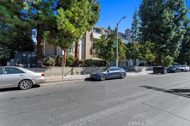 a view of parking with cars parked