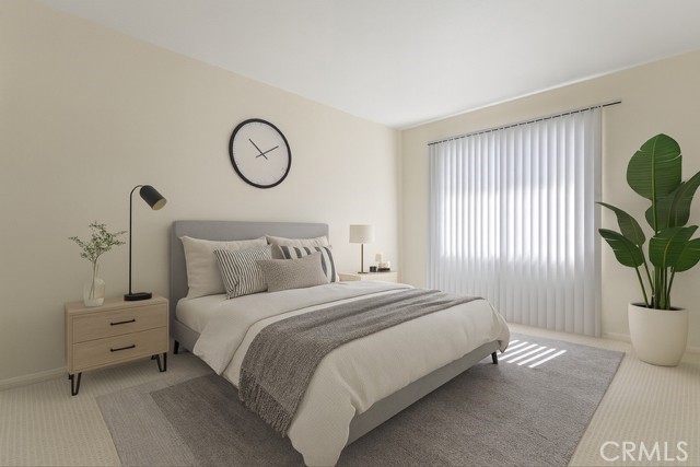 7230 Kelvin Avenue, Unit 6 Winnetka, CA 91306 - Photo 6 of 12 a bedroom with a bed and a window