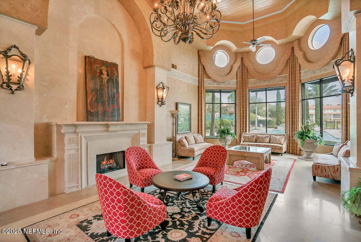 9745 Touchton Road, Unit 2421 Jacksonville, FL 32246 - Photo 15 of 26 a living room with furniture and a large window