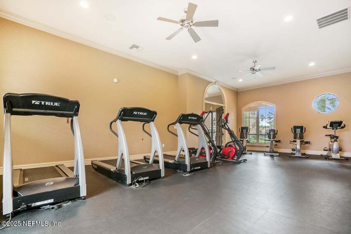 9745 Touchton Road, Unit 2421 Jacksonville, FL 32246 - Photo 22 of 26 a view of a room with gym equipment