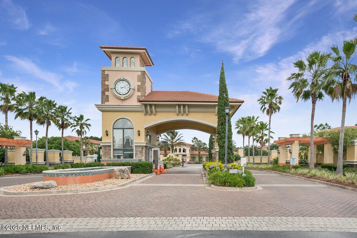 9745 Touchton Road, Unit 2421 Jacksonville, FL 32246 - Photo 24 of 26 a front view of a building with garden