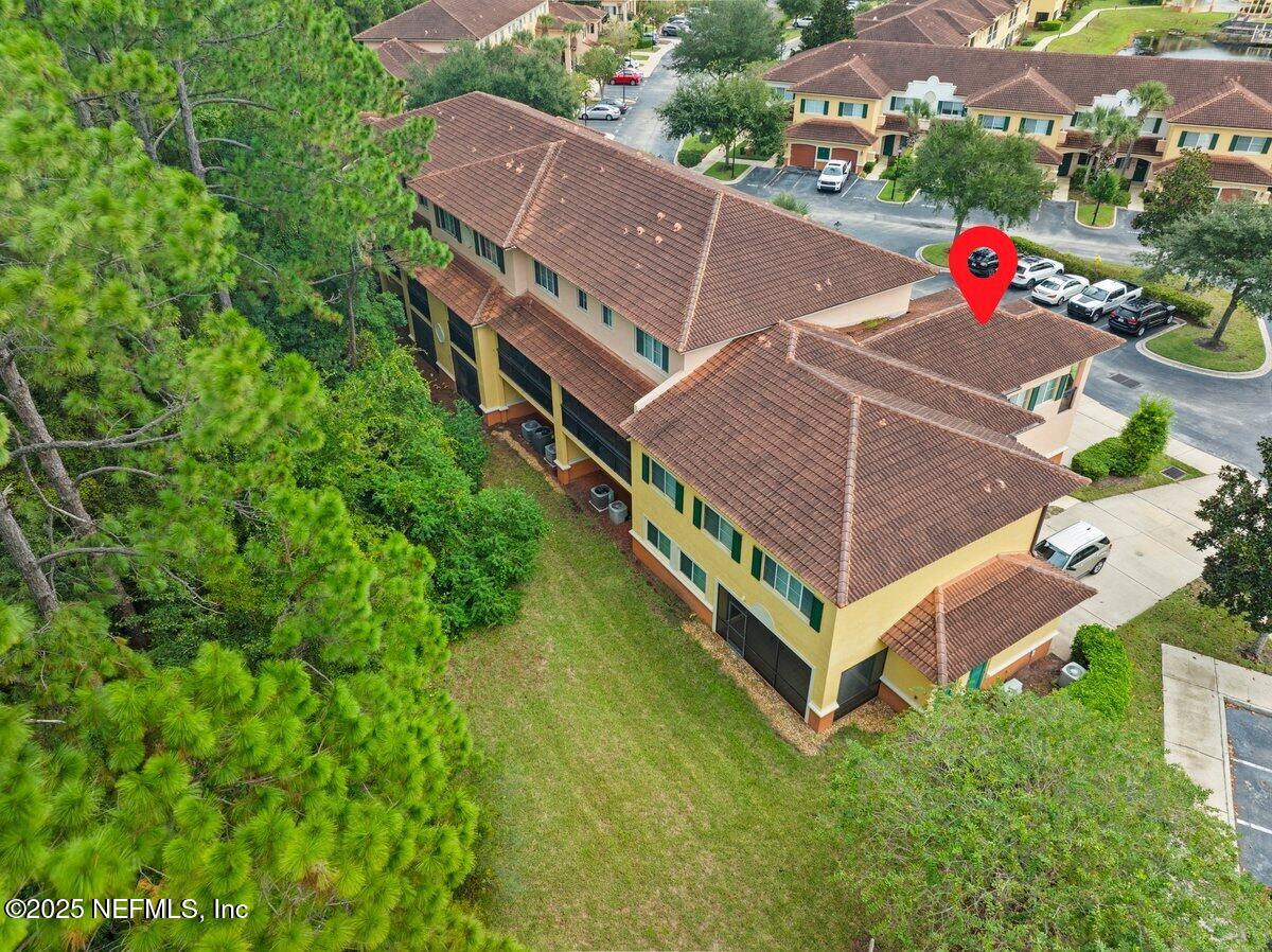 9745 Touchton Road, Unit 2421 Jacksonville, FL 32246 - Photo 26 of 26 an aerial view of residential houses with yard