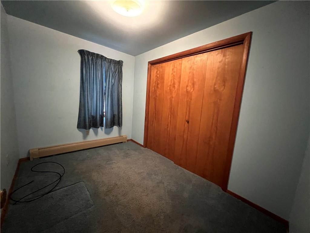 286 East Main Street Mount Pleasant, PA 15666 - Photo 11 of 30 an empty room with windows