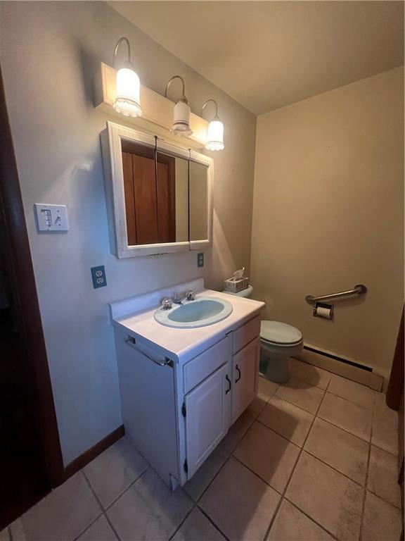 286 East Main Street Mount Pleasant, PA 15666 - Photo 12 of 30 a bathroom with a sink a toilet and mirror