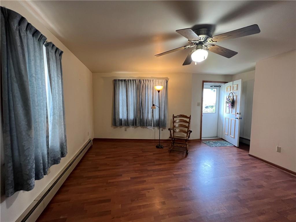 286 East Main Street Mount Pleasant, PA 15666 - Photo 5 of 30 a view of an empty room with window and wooden floor