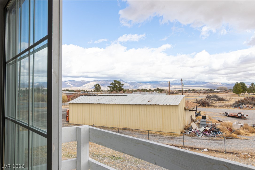 1891 Brian Road Pahrump, NV 89048 - Photo 30 of 50 Water view featuring a mountain view and fence