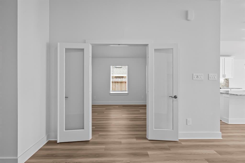 562 Bluebell Maiden Court Magnolia, TX 77354 - Photo 8 of 13 a view of entryway with wooden floor
