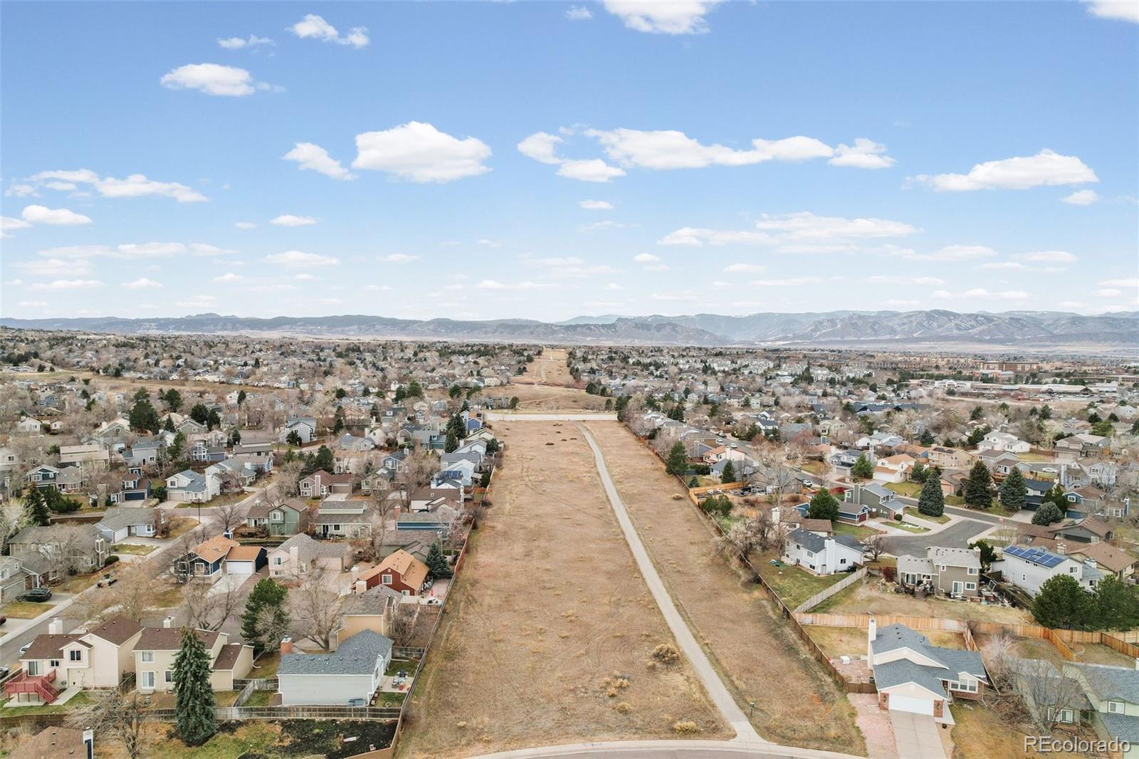 9170 Stargrass Circle Highlands Ranch, CO 80126 - Photo 4 of 39 an aerial view of a city