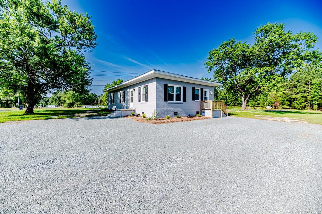 222 St Andrews Church Road Sanford, NC 27332 - Photo 6 of 24 a front view of house with yard and green space