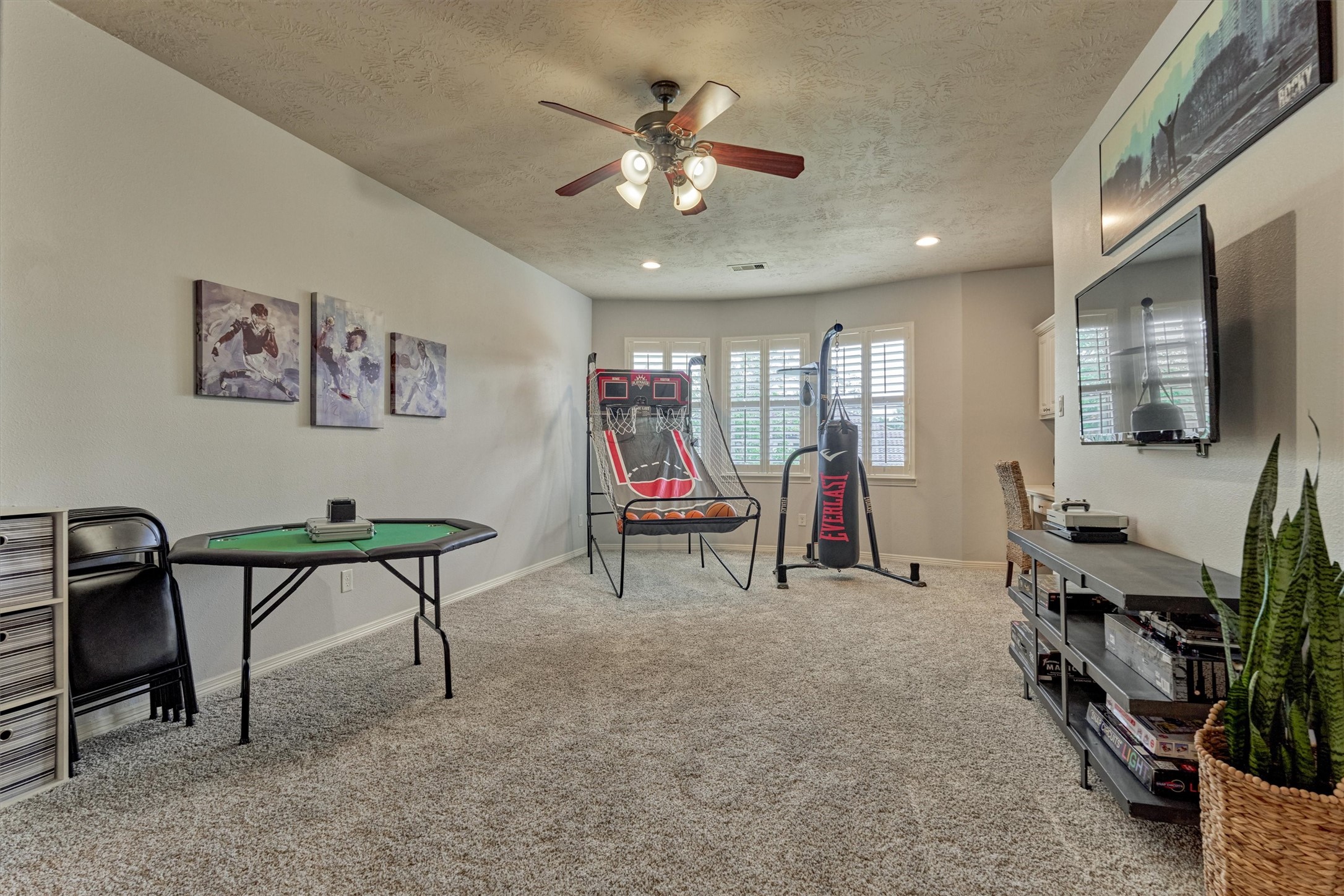 67 South Sage Sparrow Circle Spring, TX 77389 - Photo 43 of 49 a living room with furniture and a flat screen tv