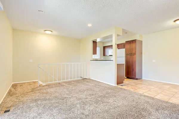 a view of a kitchen with a sink