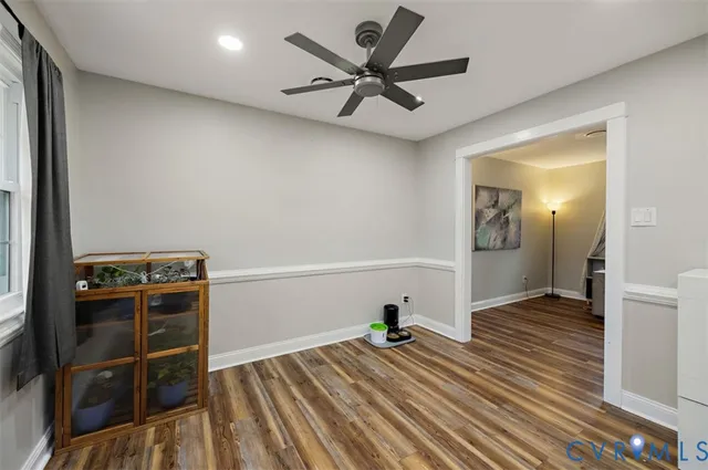 a view of a livingroom with wooden floor