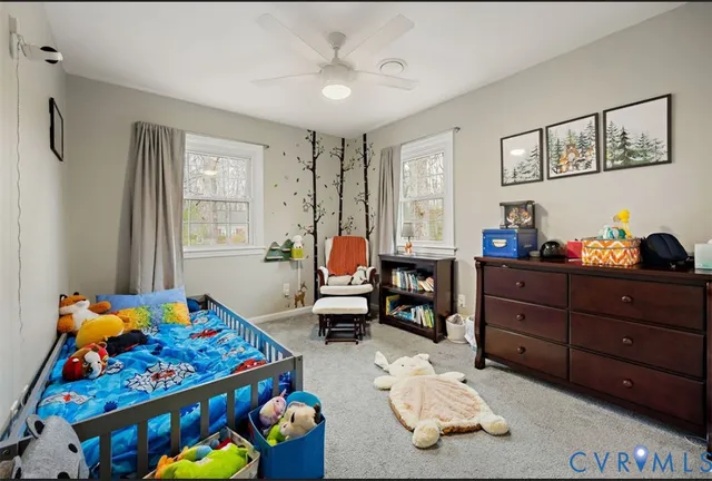 a bed room with furniture and decor