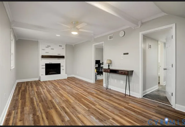 a bedroom with a bed and a fireplace