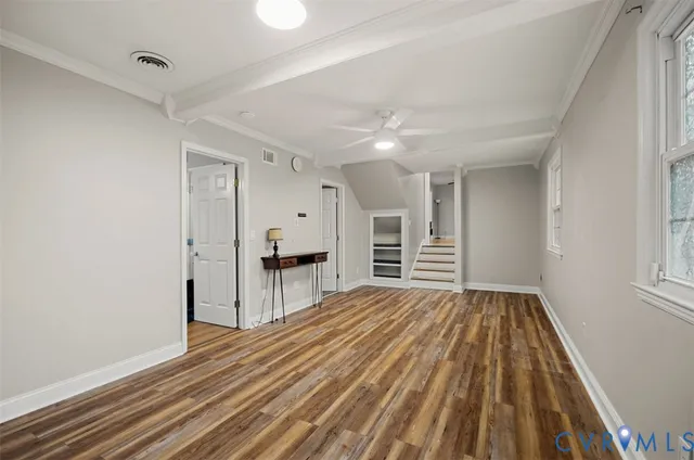 a view of kitchen and wooden floor