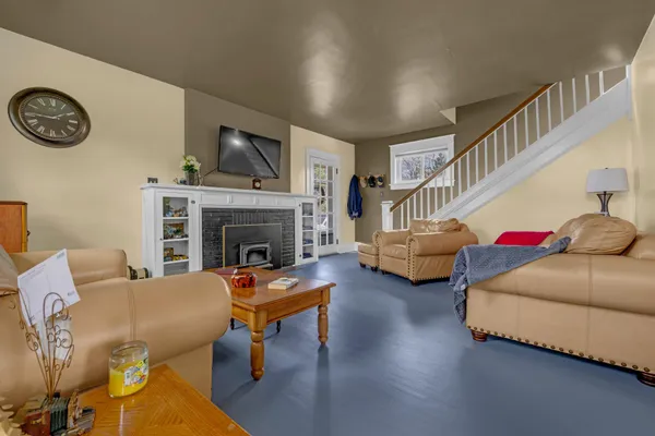 a living room with furniture and a couch