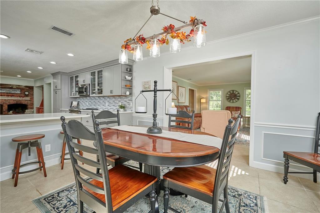 1565 48th Avenue Vero Beach, FL 32966 - Photo 18 of 34 a view of a dining room with furniture