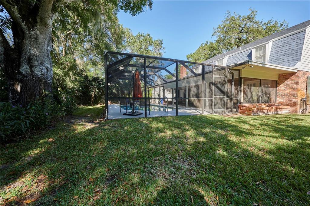 1565 48th Avenue Vero Beach, FL 32966 - Photo 5 of 34 a view of a park that has a tree on the side of it