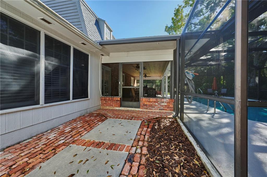 1565 48th Avenue Vero Beach, FL 32966 - Photo 7 of 34 a view of a entryway door front of house