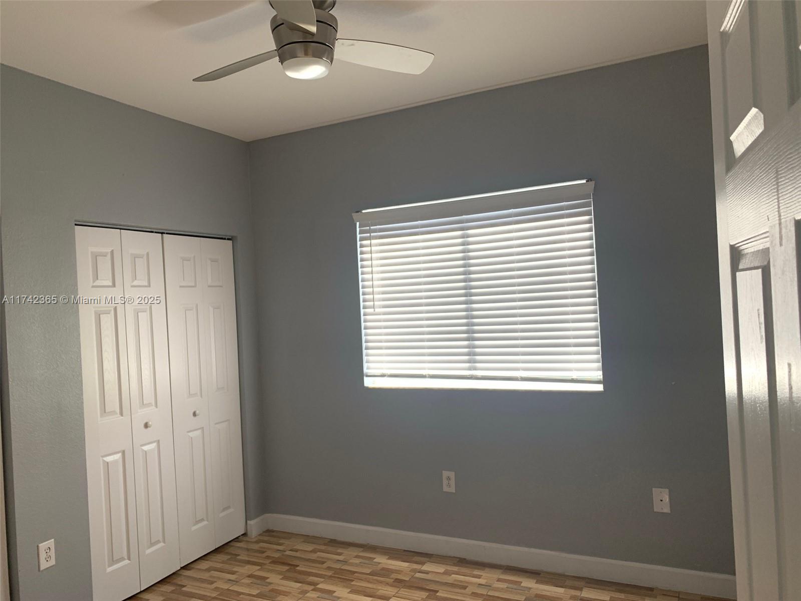 3544 Northeast 3rd Drive Homestead, FL 33033 - Photo 20 of 25 a view of an empty room with a window