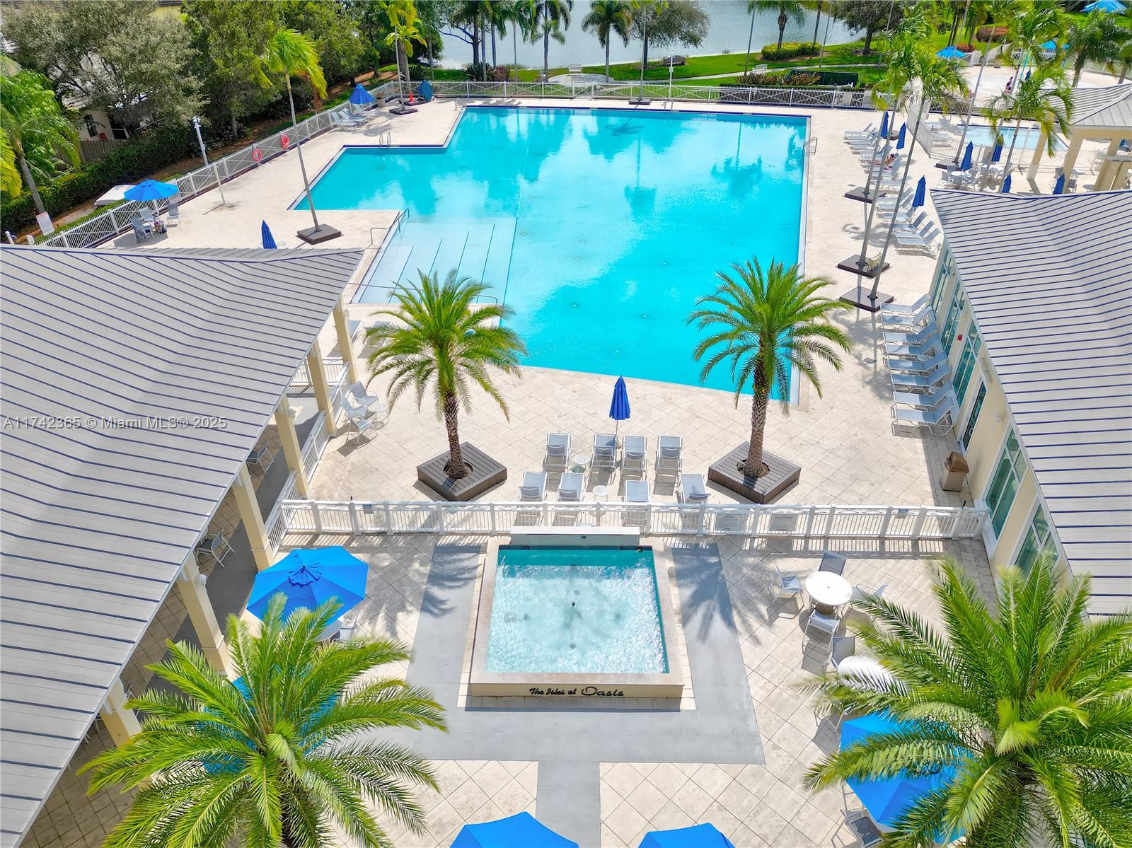 3544 Northeast 3rd Drive Homestead, FL 33033 - Photo 2 of 25 a view of swimming pool with outdoor seating