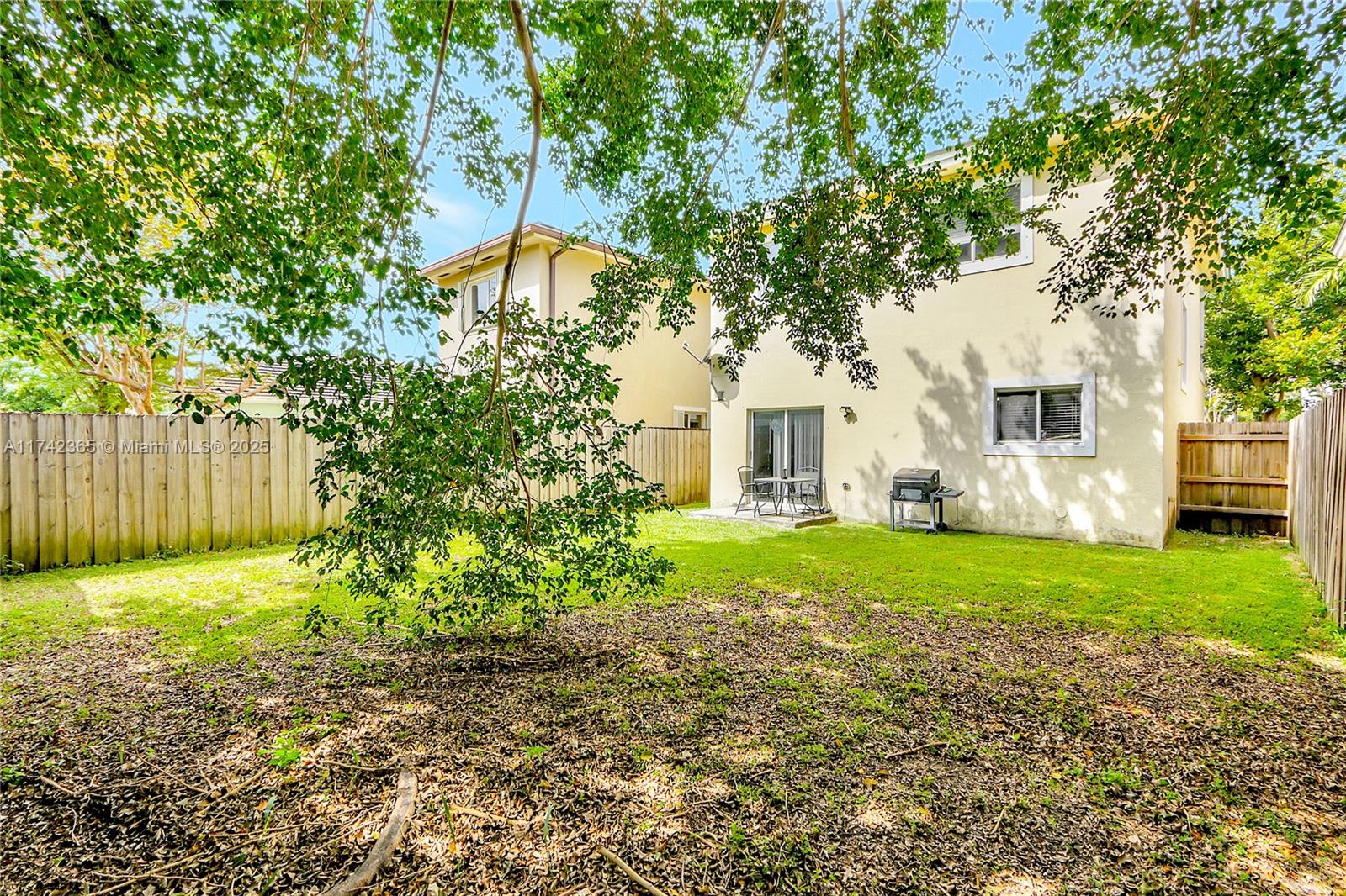 3544 Northeast 3rd Drive Homestead, FL 33033 - Photo 21 of 25 a front view of a house with garden