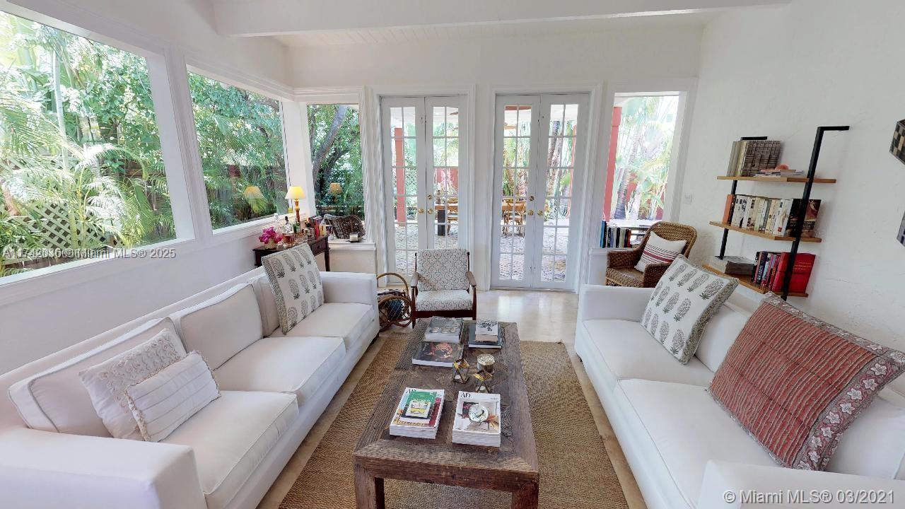 310 Glenridge Road Key Biscayne, FL 33149 - Photo 3 of 18 a living room with furniture and a large window