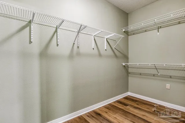 a view of a room with racks on the wall