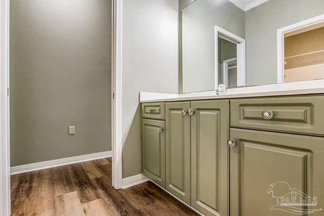 a view of a door and a mirror