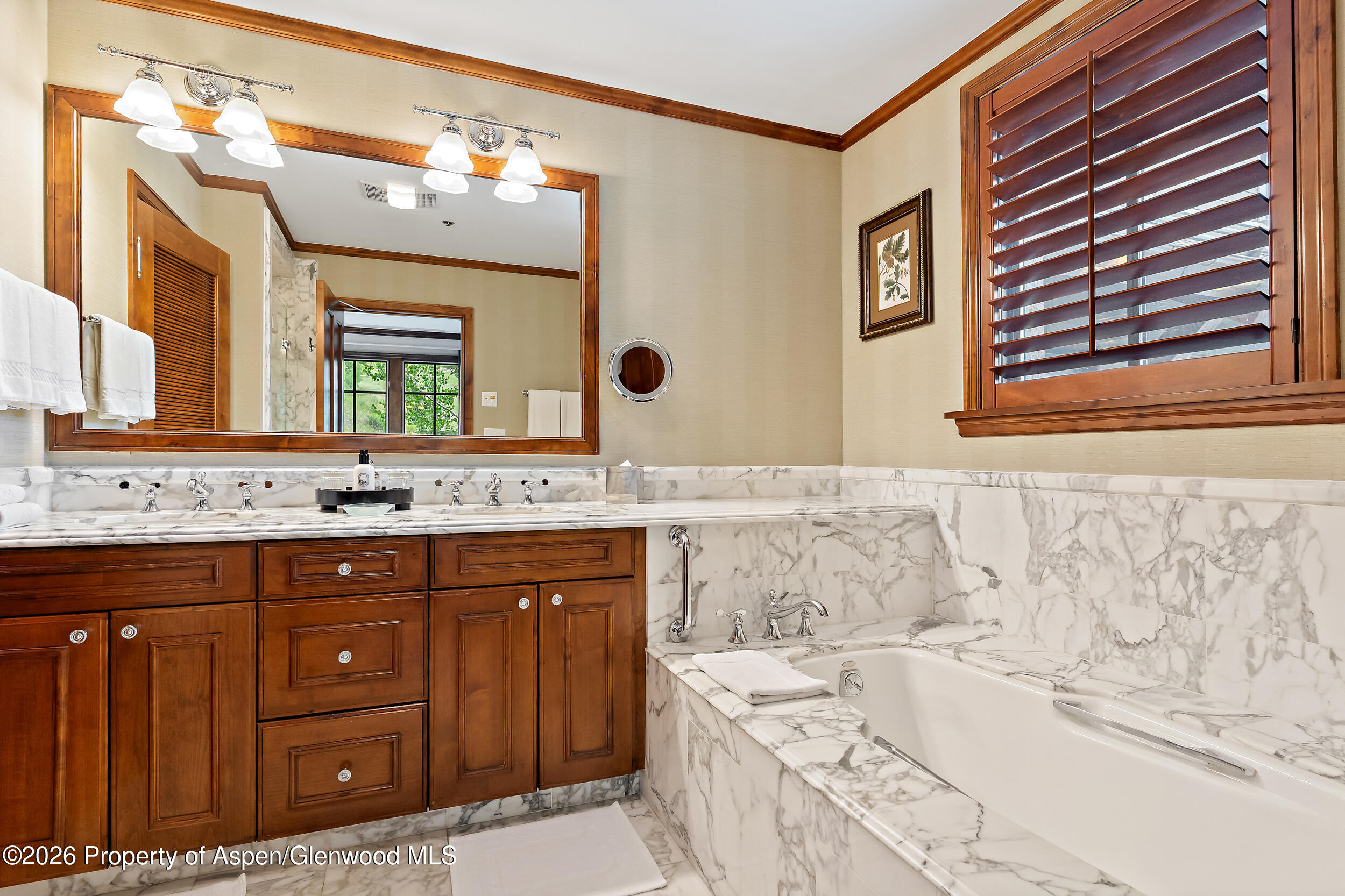 39 Boomerang Road, Unit 8210/WINTER INTEREST 3 Aspen, CO 81611 - Photo 11 of 44 a bathroom with a sink and a mirror