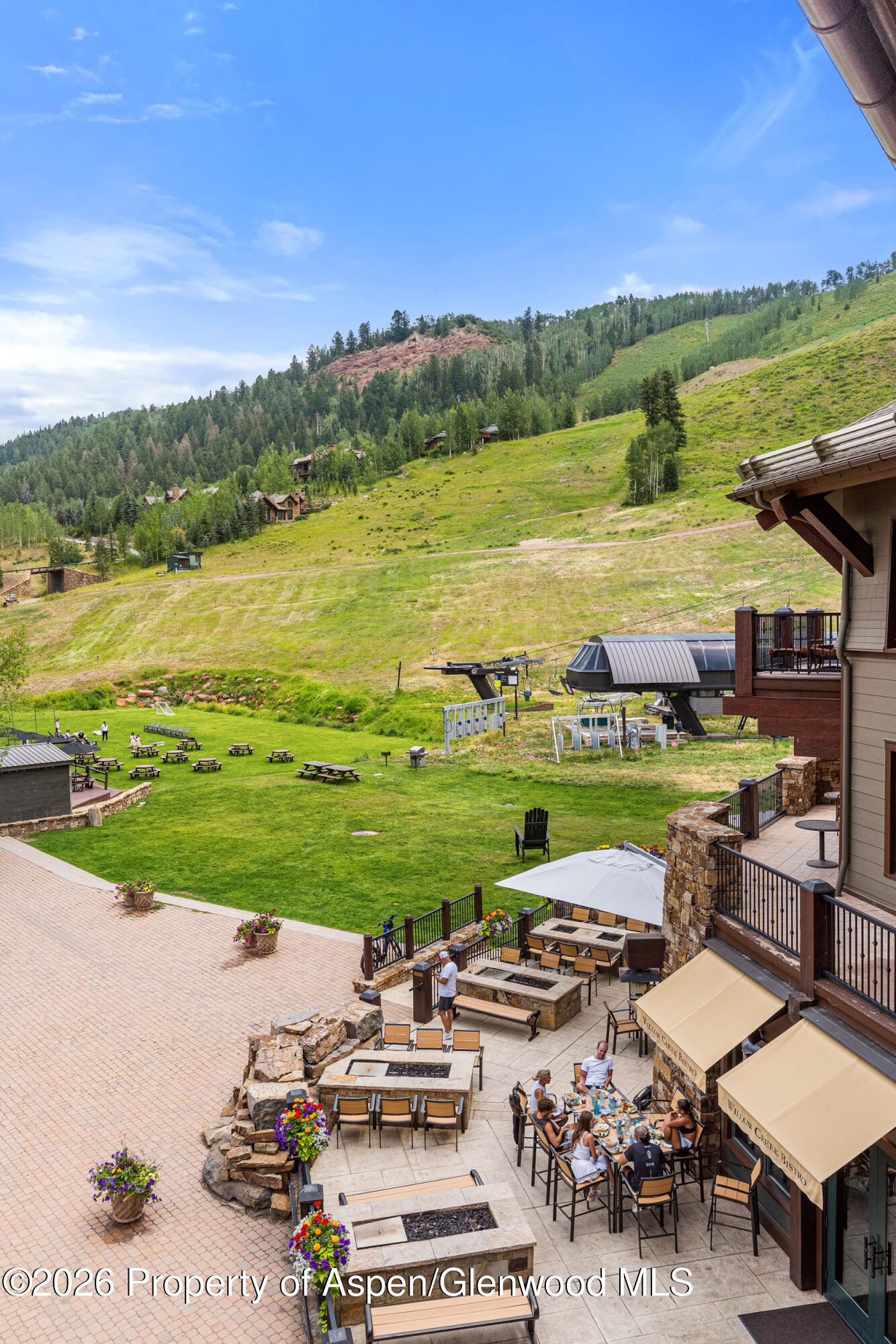 39 Boomerang Road, Unit 8210/WINTER INTEREST 3 Aspen, CO 81611 - Photo 25 of 44 a view of a lake with a yard
