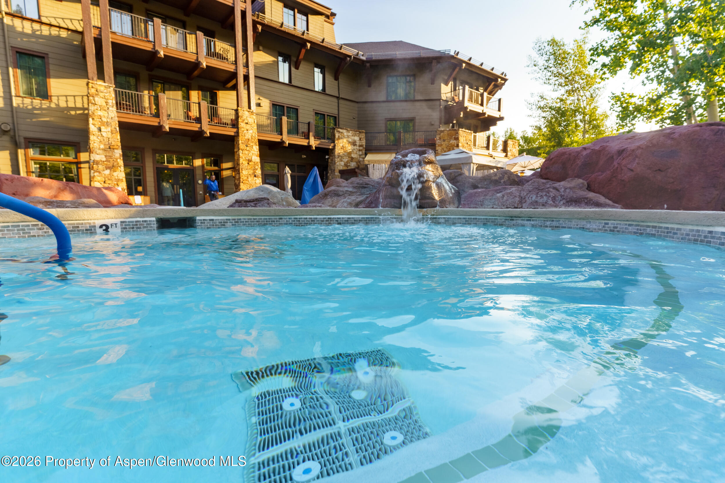 39 Boomerang Road, Unit 8210/WINTER INTEREST 3 Aspen, CO 81611 - Photo 29 of 44 a view of a building with a yard