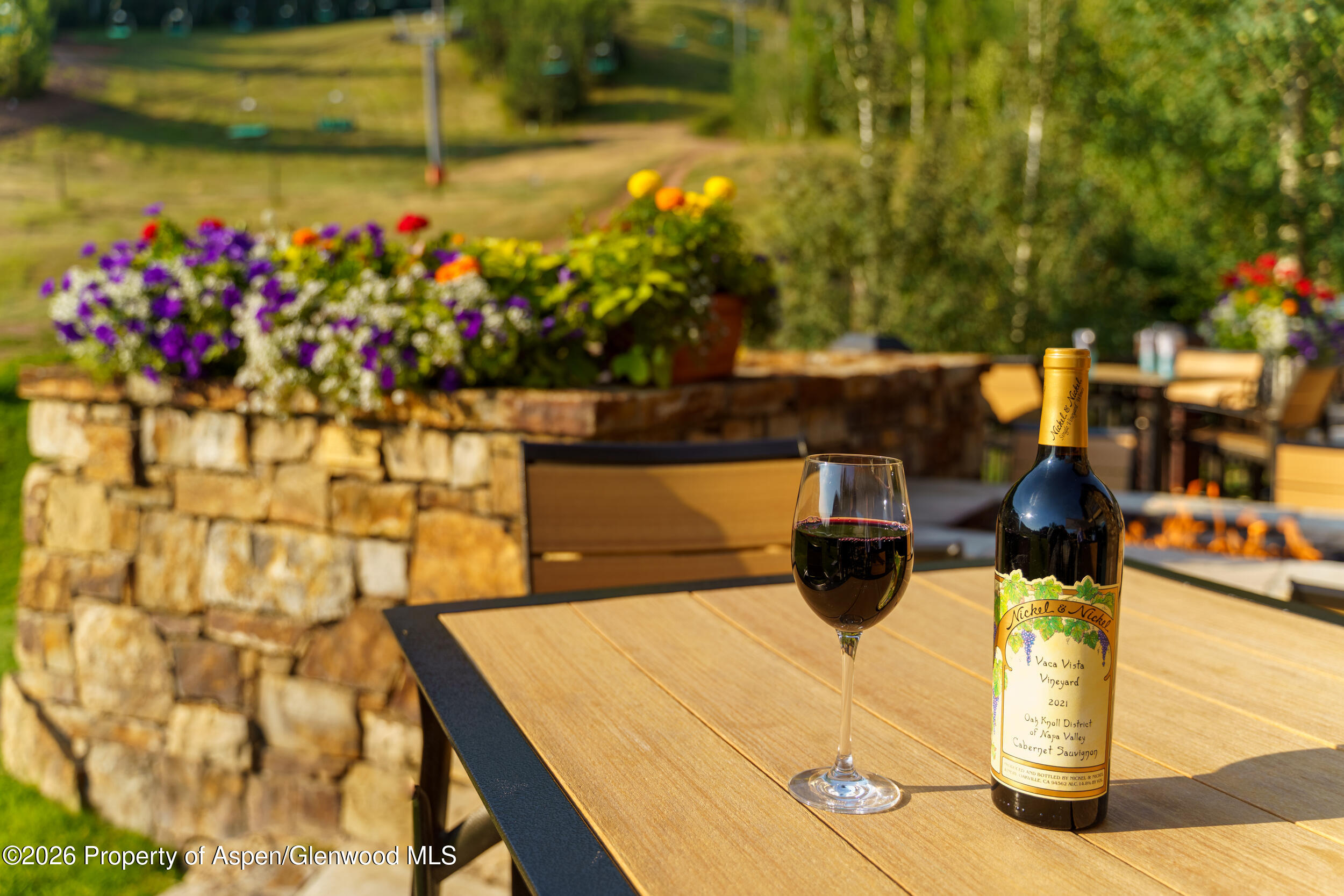 39 Boomerang Road, Unit 8210/WINTER INTEREST 3 Aspen, CO 81611 - Photo 32 of 44 a bunch of flowers are sitting on a table